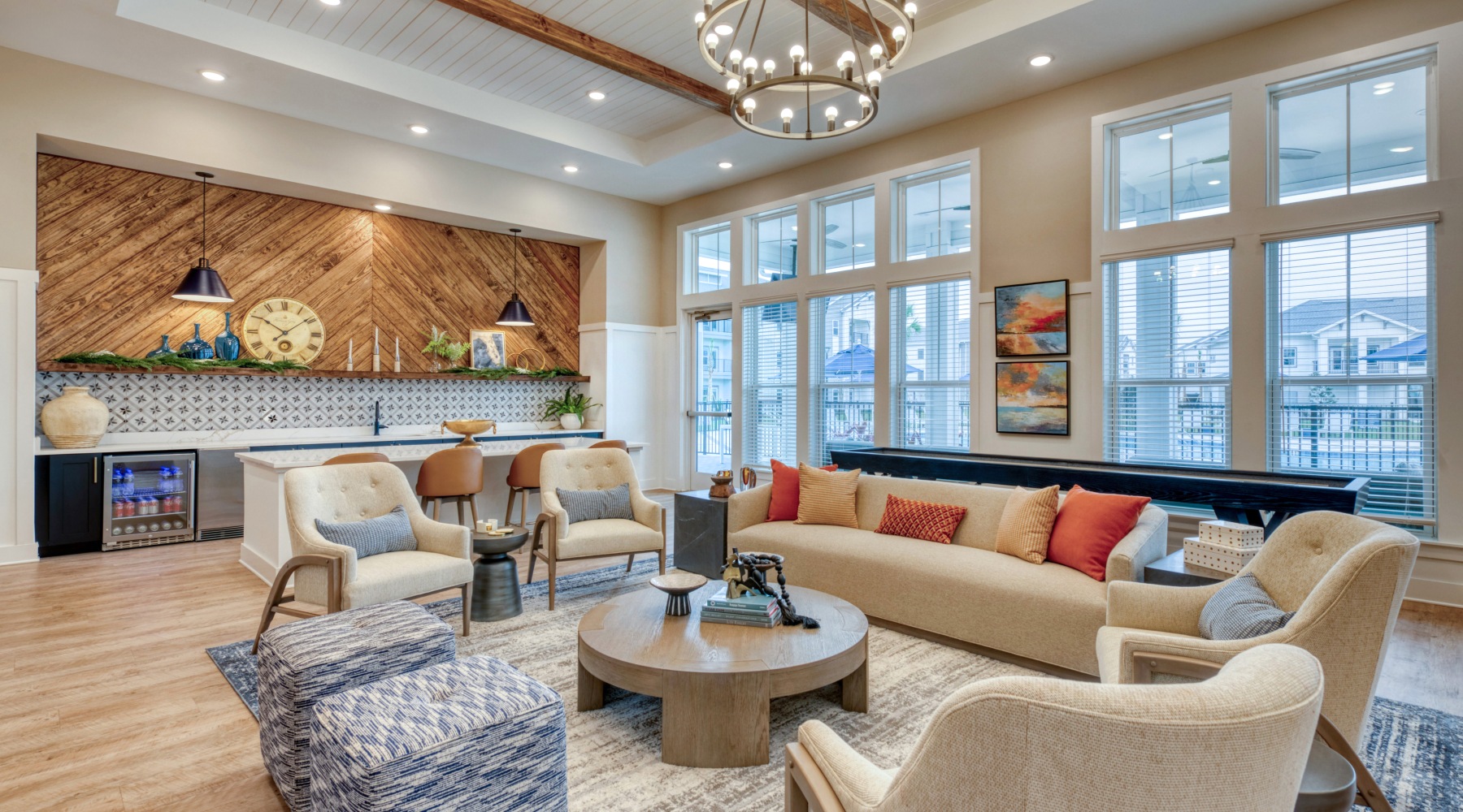 a clubroom with couches and chairs